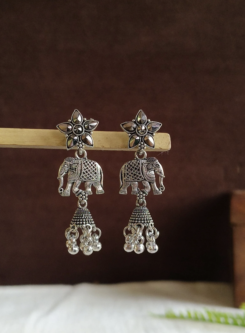 Oxd star & elephant earring