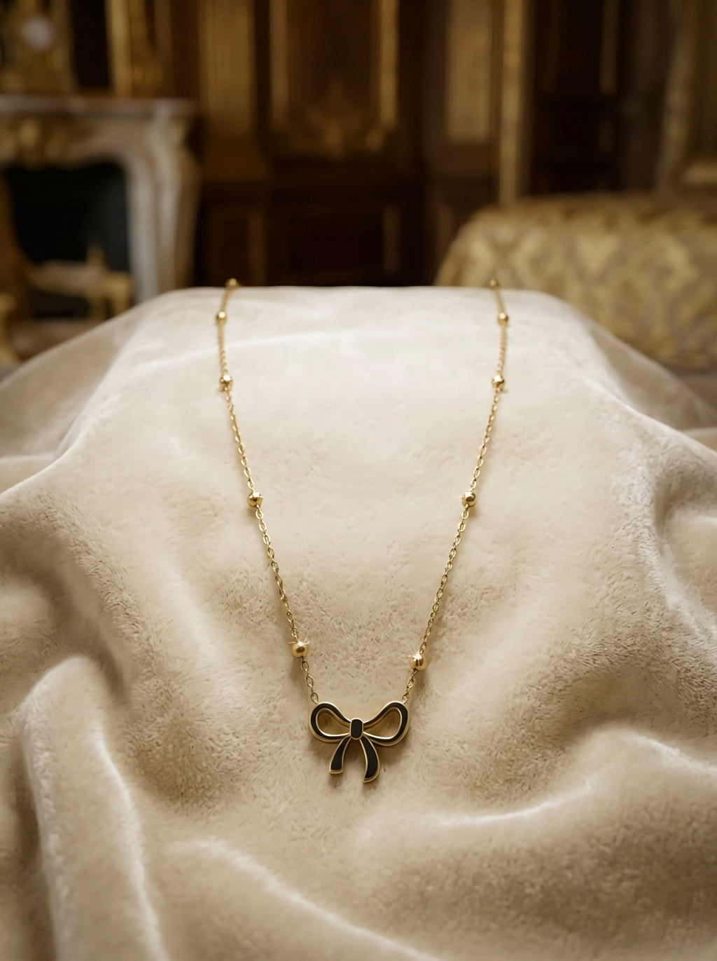 BOW PENDANT