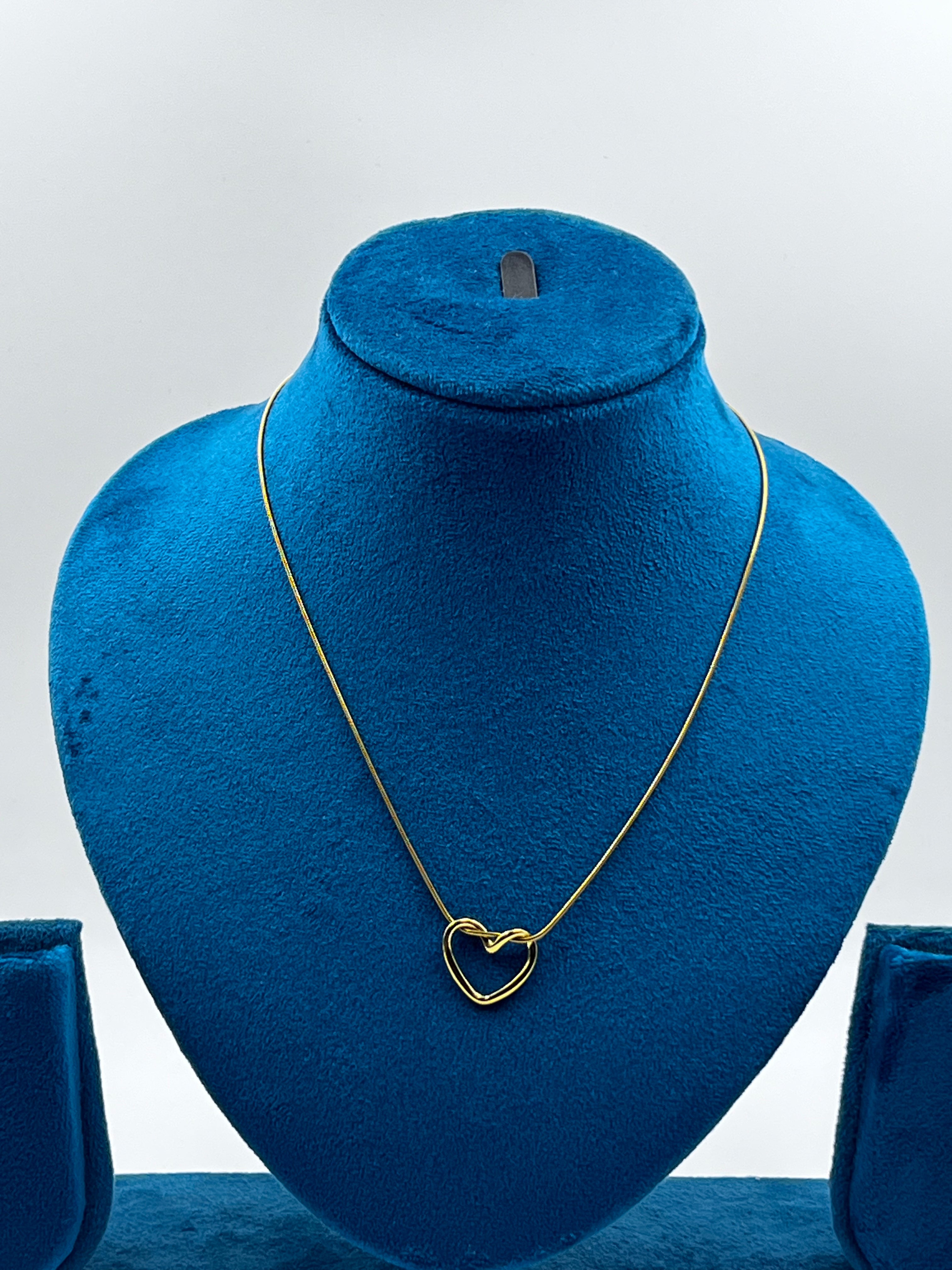 HOLLOW HEART PENDANT