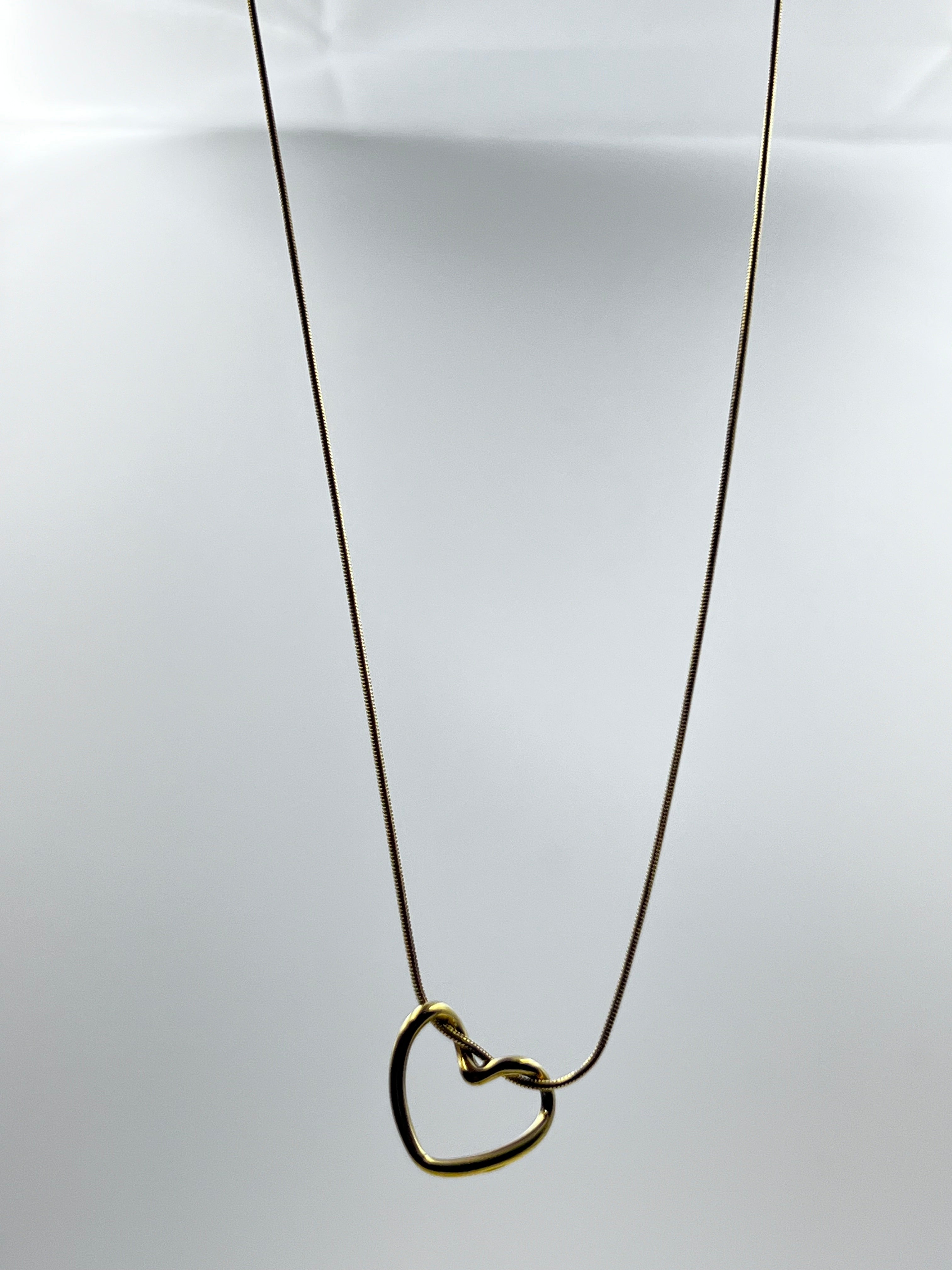 HOLLOW HEART PENDANT