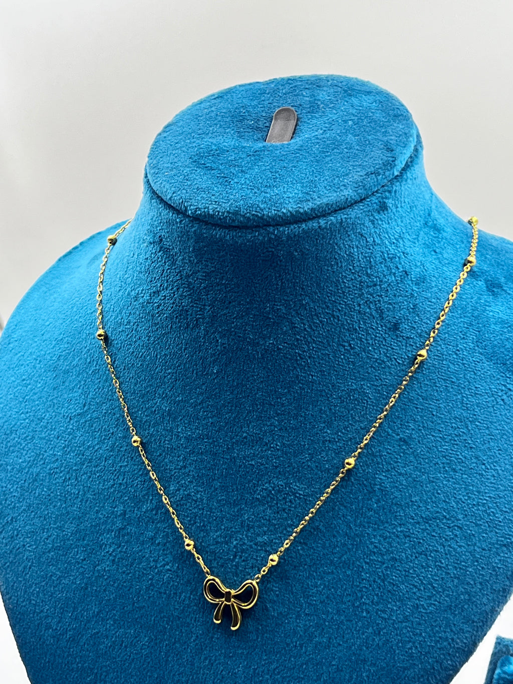 BOW PENDANT